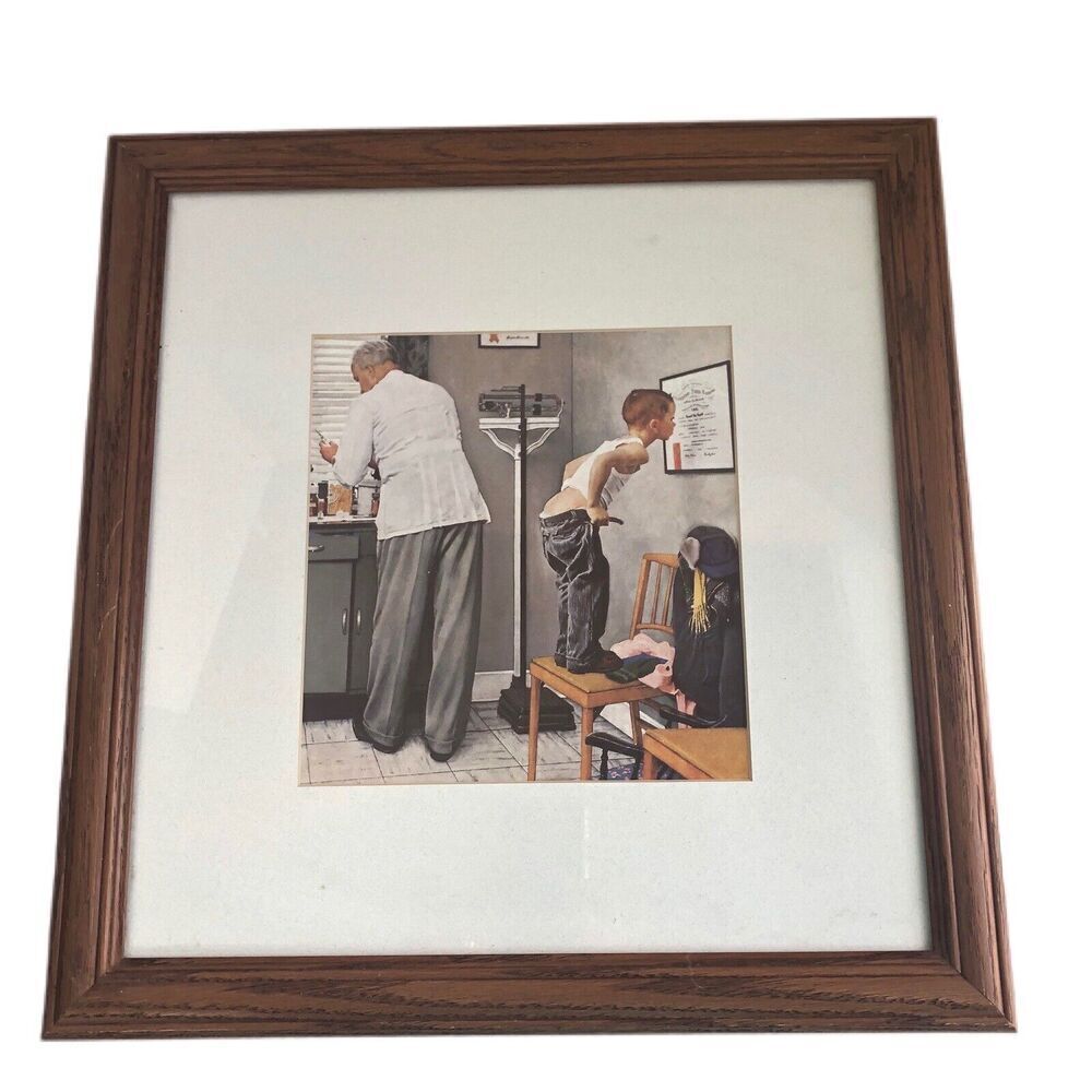 Norman Rockwell “Before the Shot” at The Doctor’s Office Framed Print